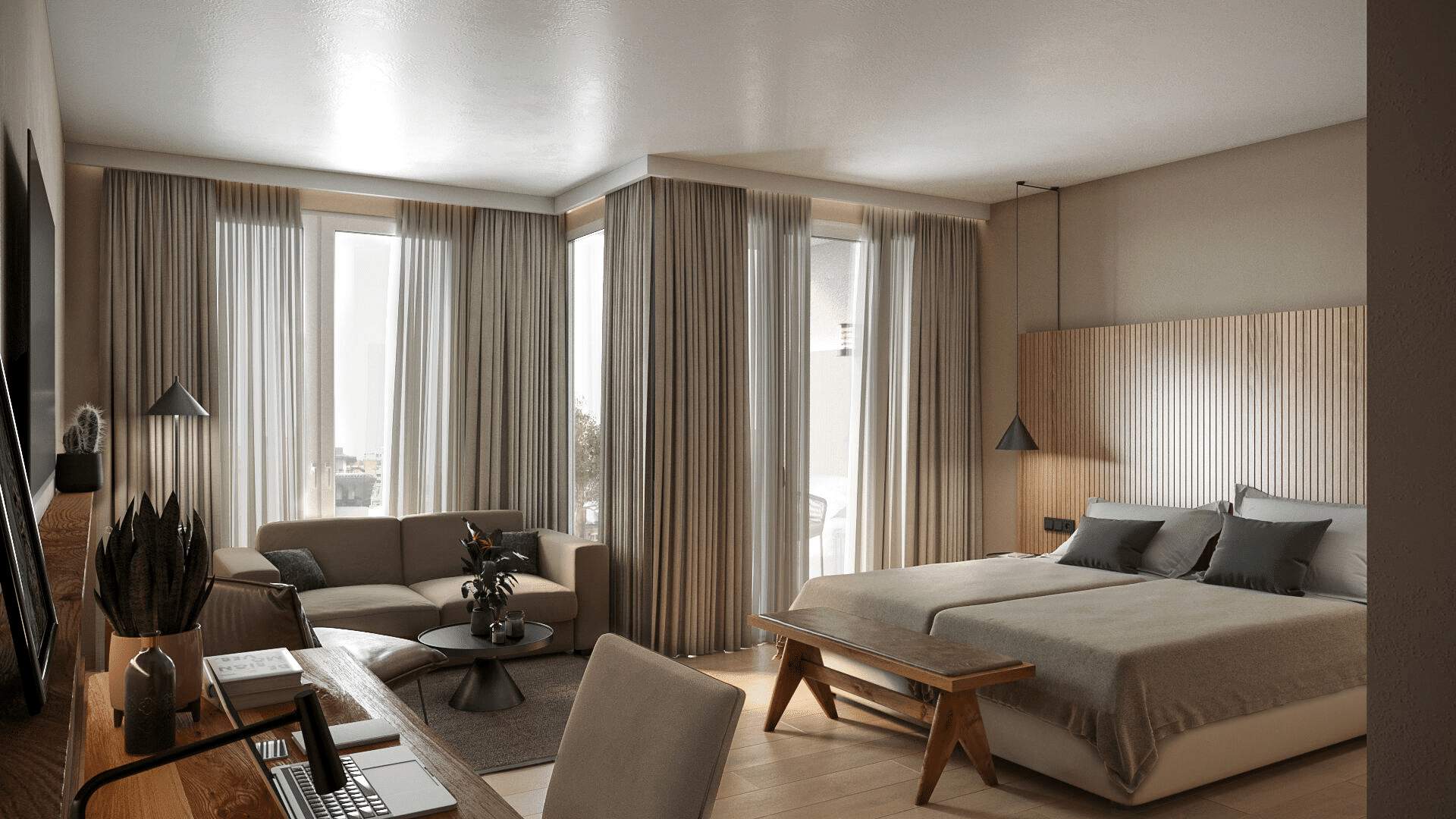 Doppelbett, Sitzecke und Schreibtisch in einem beigefarbenen Zimmer des Lifestyle-Hotels Nouri