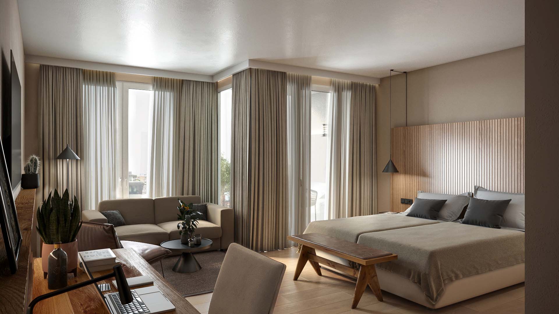 Arbeitstisch, Sofa und ein Doppelbett in einem beige dekorierten Hotelzimmer